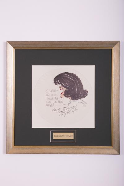 A caricature of Elizabeth Taylor drawn by Jack's Place namesake Jack Rosen.