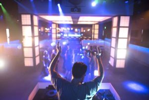 DJ performing at a party at 3NINE.