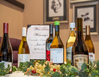 Wine Down Wednesday at Jack’s Place Offer