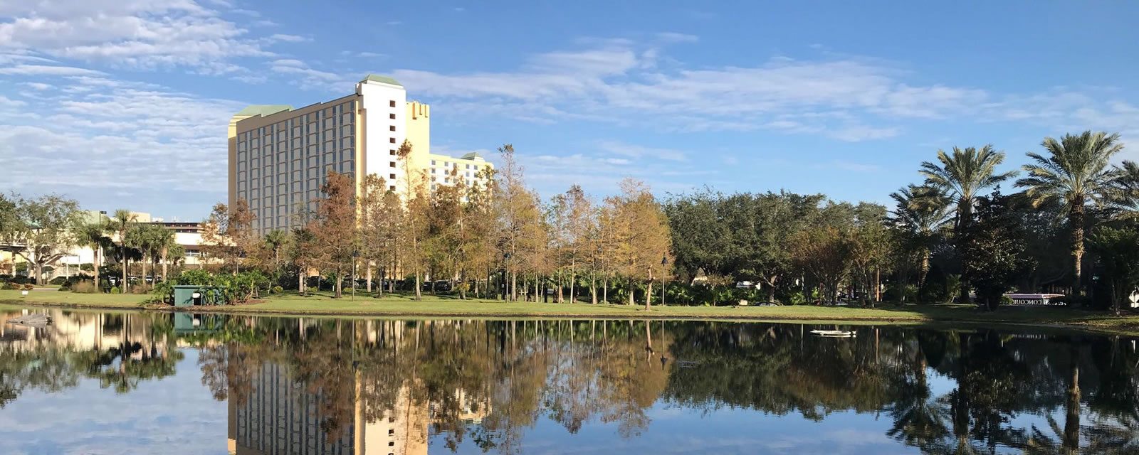 Shot of Rosen Plaza from the other side of lake with reflection in water